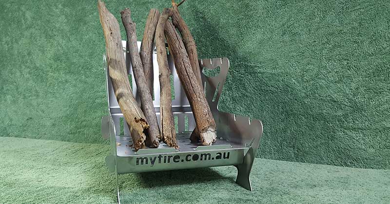 eco-friendly campfire habits: stacking wood vertically in MYFire